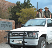 Hunters on vehicle